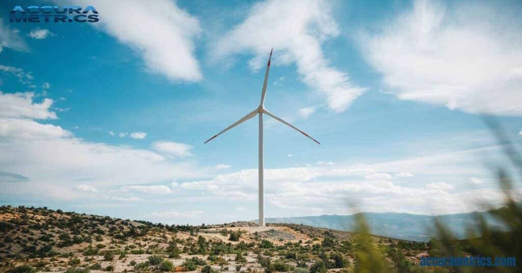 Wind turbine with large blades in a blue sky