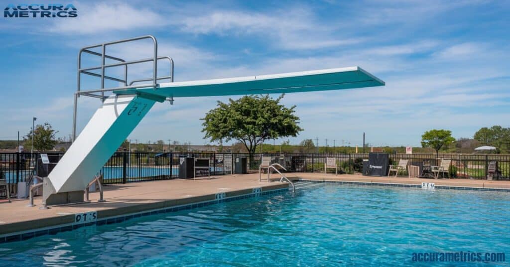 A diving board at a poolside, providing a thrilling spot for swimmers.