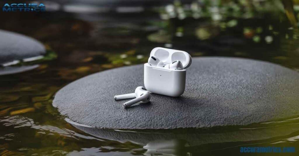 about one inche AirPods on a stone surface.