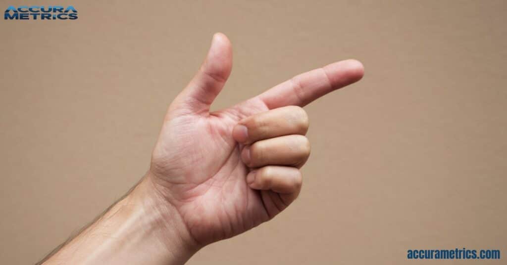 Hand showing thumb, index, and pinky finger for one inch measurement approximations