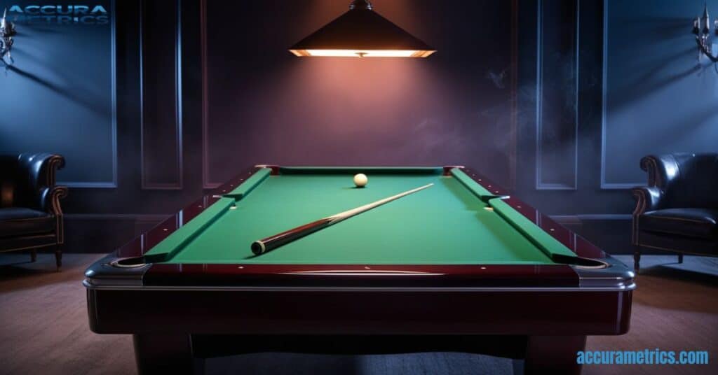 Pool cue placed on the edge of a pool table in a moody, dimly lit environment.