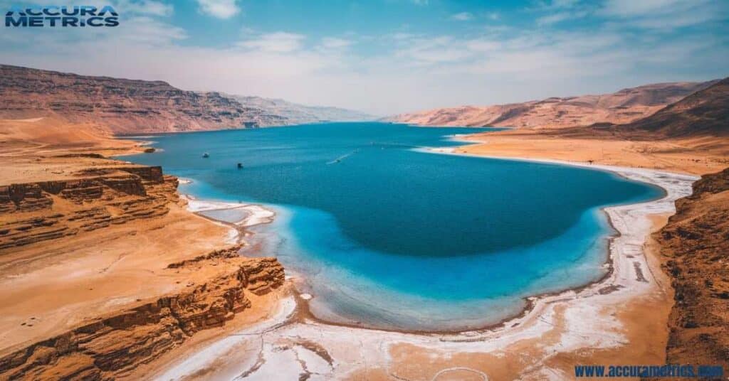 Aerial view of the Dead Sea and its surrounding desert landscape.