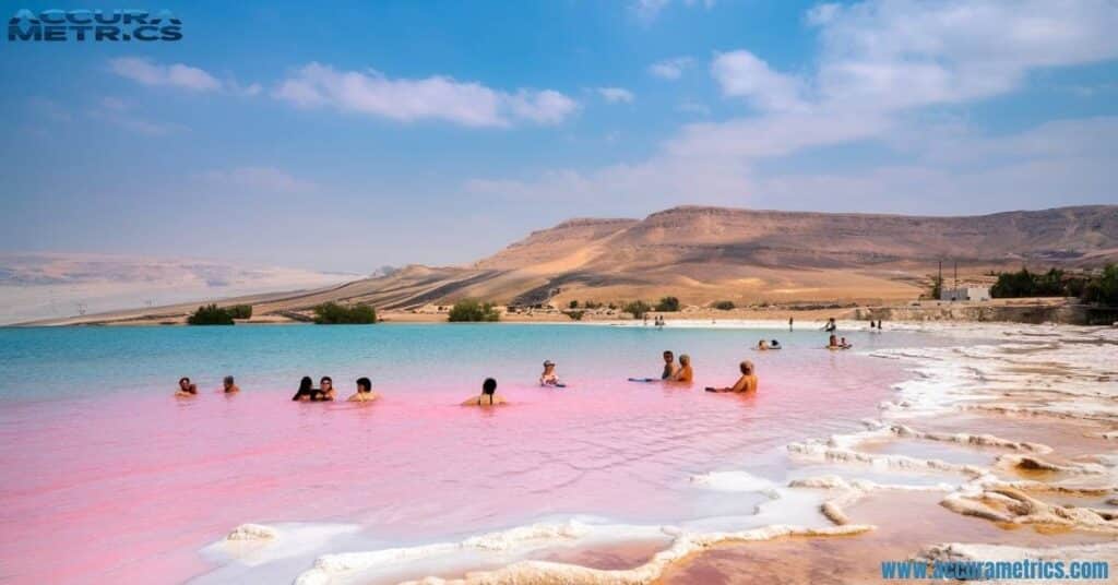 Tourists floating in waters, enjoying the natural spa experience.