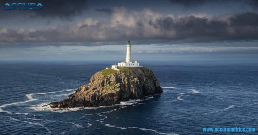 Fastnet Rock Lighthouse on a small rocky island in the Atlantic Ocean, Ireland, marking a key maritime route.