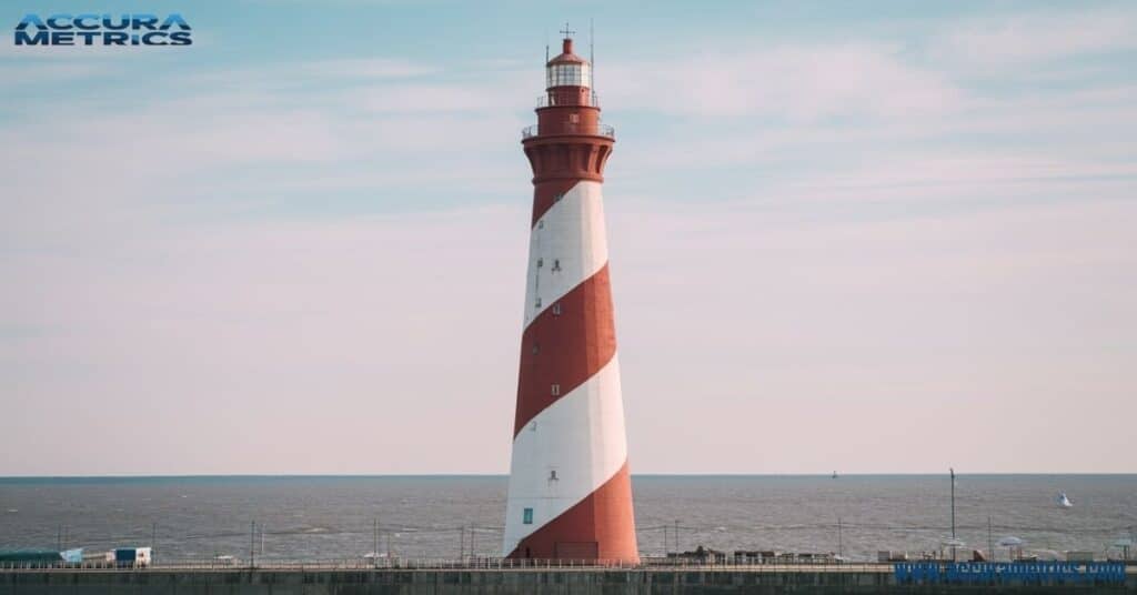 Lesnoy Mole Rear Range Light in Kaliningrad, Russia, the tallest lighthouse in the country, with red and white stripes.