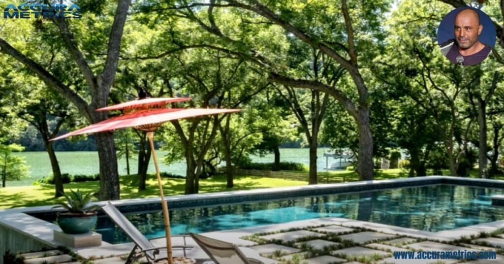 A modern pool bordered by a stone patio