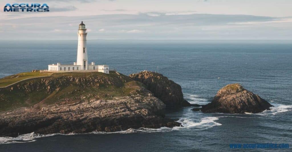 Tory Island Lighthouse on a rocky island in the North Atlantic Ocean, Ireland, guiding ships along the coast.